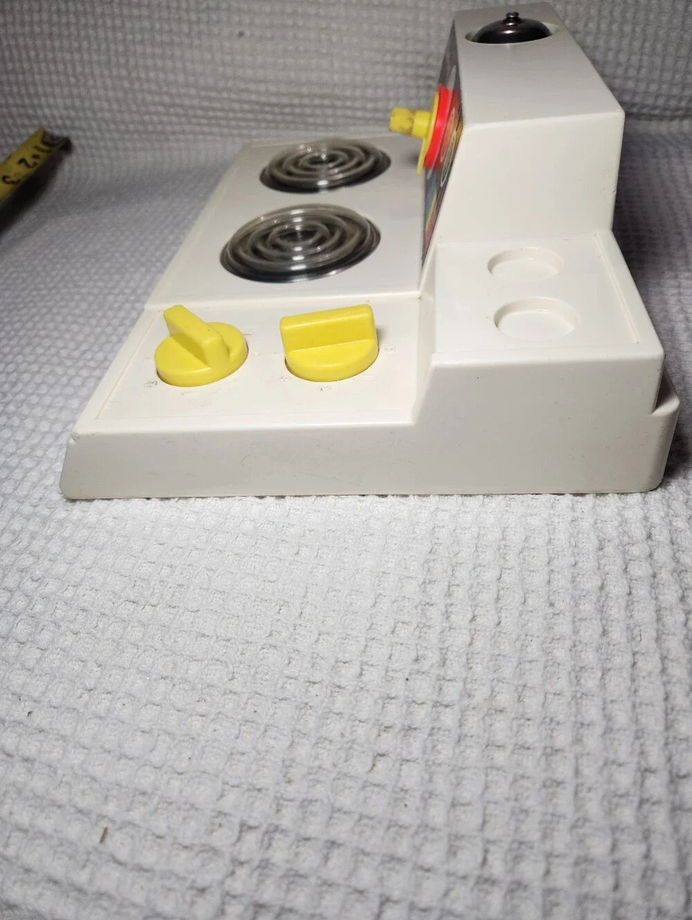 Fisher-Price Vintage Toy Stove in White with Yellow Accents